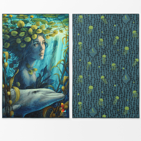 Reversible XL artistic towel showing an underwater scene with a woman and dolphin on one side, and a dark blue jellyfish pattern on the other.