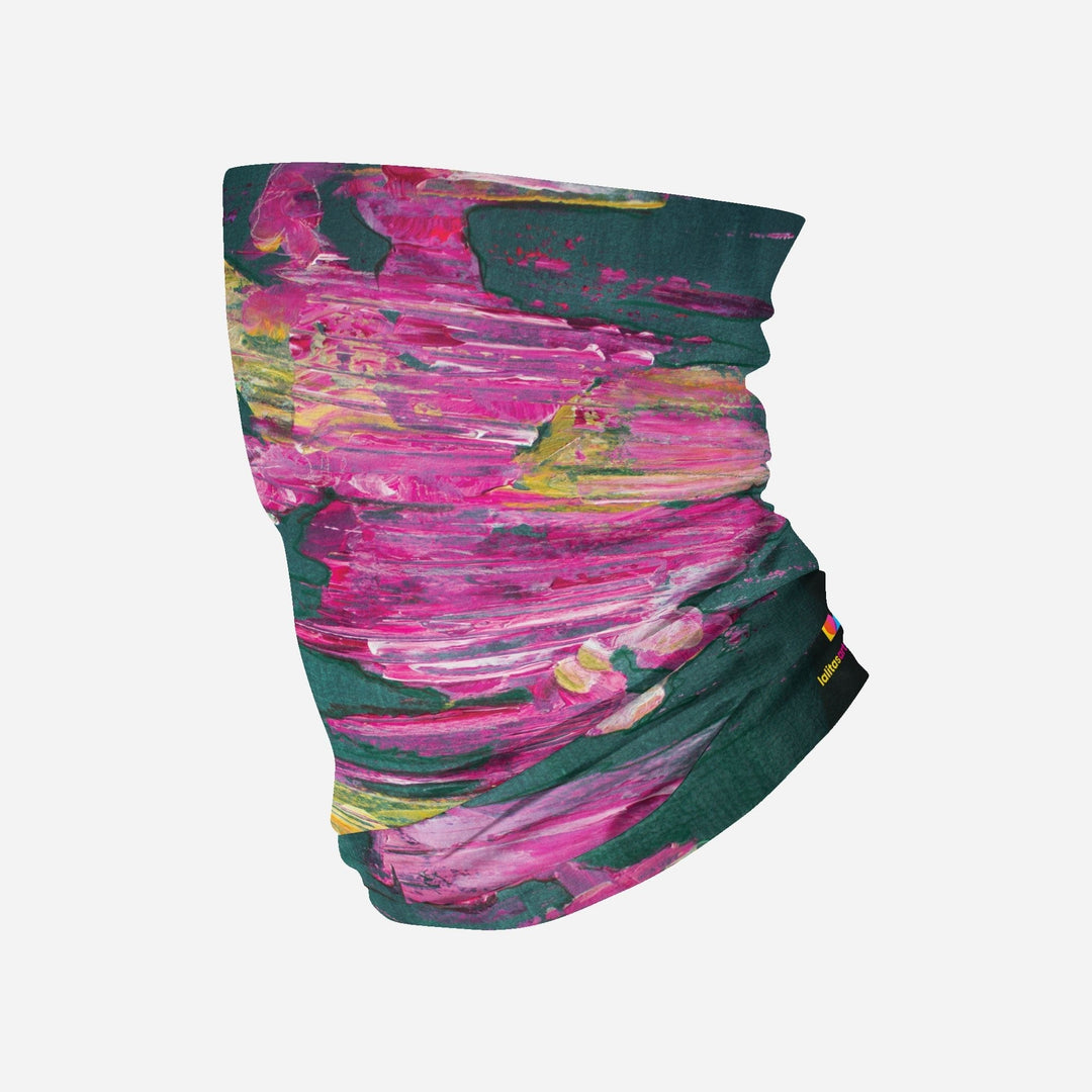 A multifunctional neck tube with a vibrant pink and green abstract floral print, laid flat against a white background.