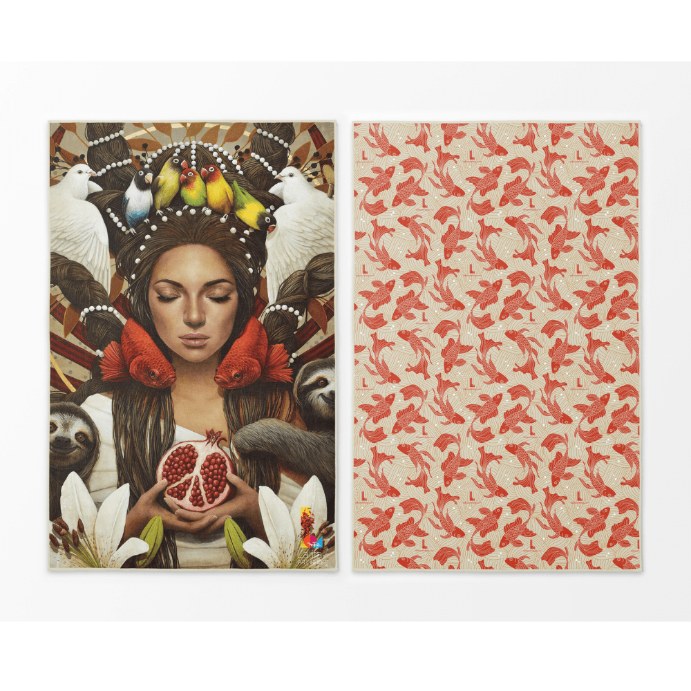 Two sides of the Guerrière Pacifique towel: one with a woman surrounded by animals and nature, the other with a red koi fish pattern.