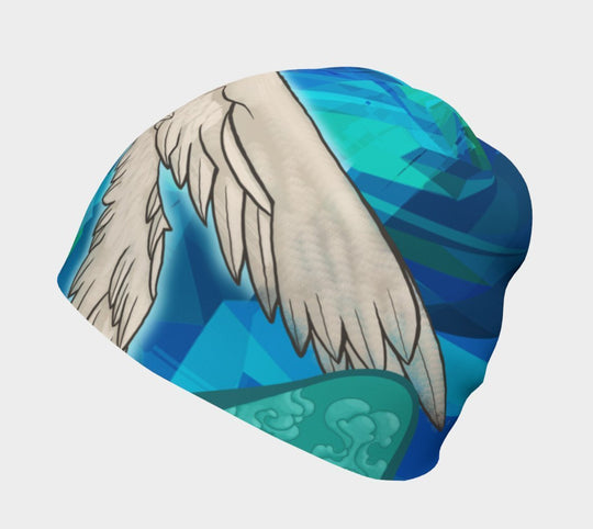 Gros plan sur la tuque Tête dans les Nuages, montrant le motif abstrait avec des ailes.