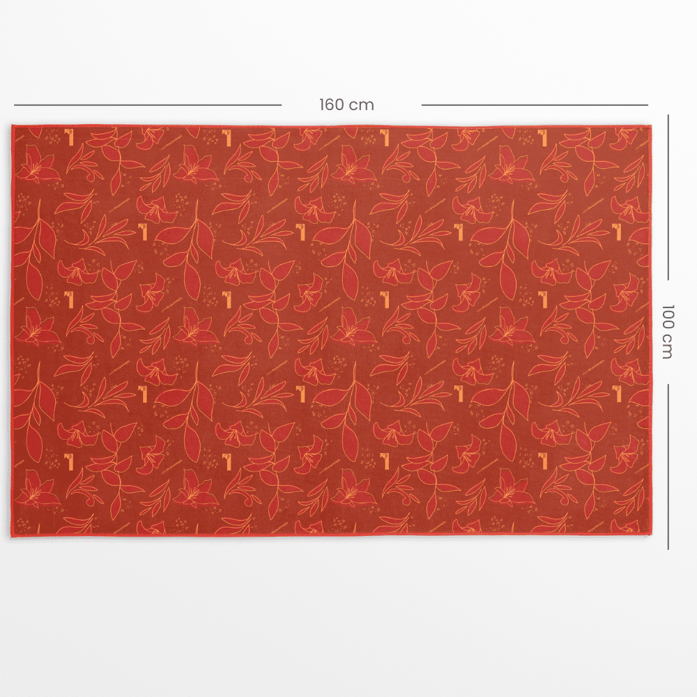 XL reversible artistic towel with dimensions 160 cm and 100 cm clearly marked on the red floral patterned side.