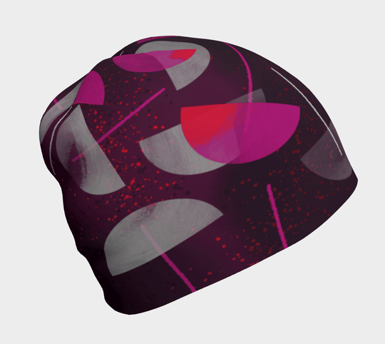 Gros plan de la tuque Parapluie Magenta, mettant en valeur son motif abstrait magenta, rose et gris.