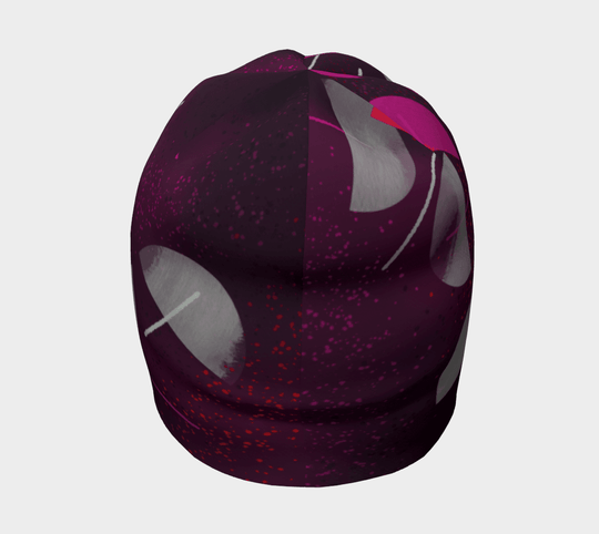 Vue de face de la tuque Parapluie Magenta, affichant le motif artistique complexe.
