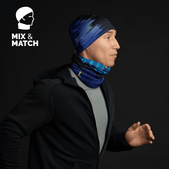 Mannequin portant la tuque « Black War » et le cache-cou assorti pour une course, démontrant la combinaison.