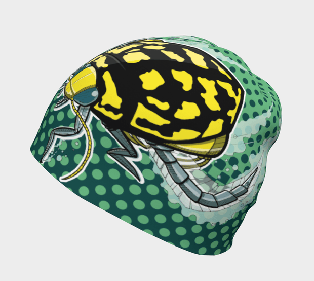 Left side view of Lalita's Art Shop Boy's beanie hat. This toque has a dots green pattern and a yellow diving beetle illustrated by André Martel 