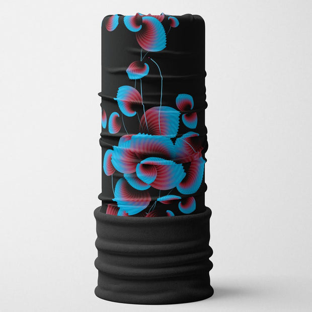 Warm and versatile tubular neck warmer with a pink, blue and black floral pattern designed by artist Zaire. 