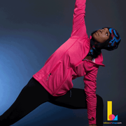 Woman doing yoga and stretching with the blue flowers thin technical beanie and the multifunctional tube. 