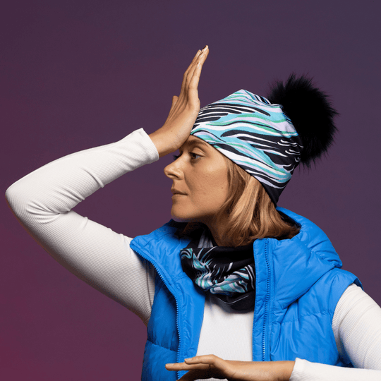 Woman wearing the Blue and Black Heron Pompom Beanie by Julie Rocheleau for the Lalita&