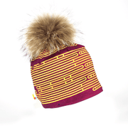 Right side view of the Magenta bamboo beanie for adults and children with big natural pompom