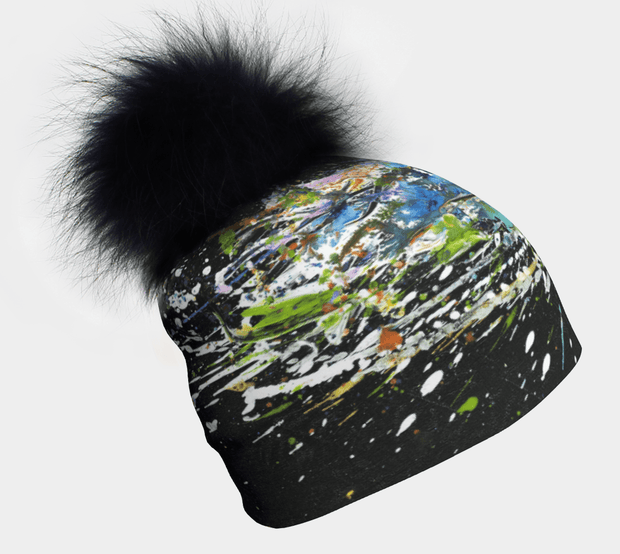 Profile photo of the Meduse beanie designed by Megane Fortin. This beanie is black with green, blue, white and orange abstract patterns