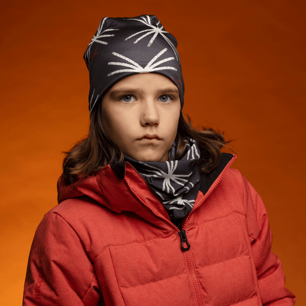 Kid wearing the Black White and Red MotifX Bamboo Beanie by Valery Goulet for the Lalita's Art Shop 24 collection