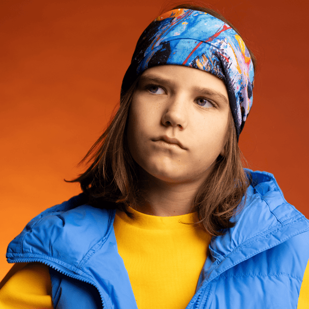 Boy wearing Megane Fortin's Matrix multifunctional fleece tube as headband for the Lalita's ArtShop 24 collection