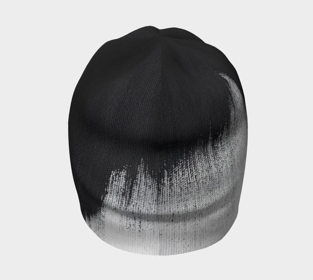 Rear view of Lalita's Art Shop Abstract Brush Stroke Grow-with-me beanie is the perfect hat to wear season after season and under your helmet. This black and white tuque is breathable with its bamboo lining and super comfortable