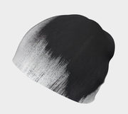 Side view of Lalita's Art Shop Abstract Brush Stroke Grow-with-me beanie is the perfect hat to wear season after season and under your helmet. This black and white tuque is breathable with its bamboo lining and super comfortable