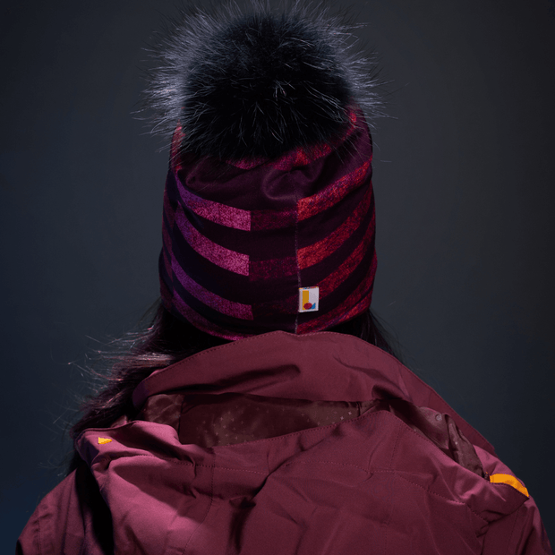 Back view of the Waves purple, pink and black toque for outdoors activities. Best midseason and winter accessory ! Created by Lalita's Art Shop Artist, Valery Goulet.
