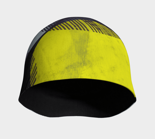 Front view of the Yellow, grey and dot pattern tuque. Very confortable, light and soft. Has a bamboo lining