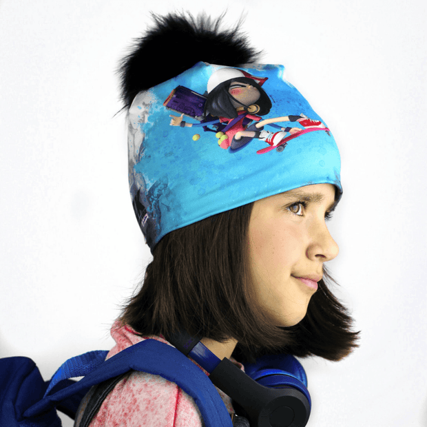 Side view of kid's tuque  created in collaboration with Canadian editor scorpion masque illustrating a young skater girl hero chasing zombies ! 